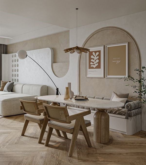 Un intérieur moderne et élégant combinant un salon et une salle à manger, avec un canapé beige, une table à manger blanche entourée de chaises en bois avec des coussins beiges, et un banc intégré. Au-dessus de la table, une suspension moderne éclaire l'espace. Sur le mur, deux cadres contiennent des œuvres d'art minimalistes dans des tons neutres. Le sol en bois clair et une plante verte complètent l'aménagement.